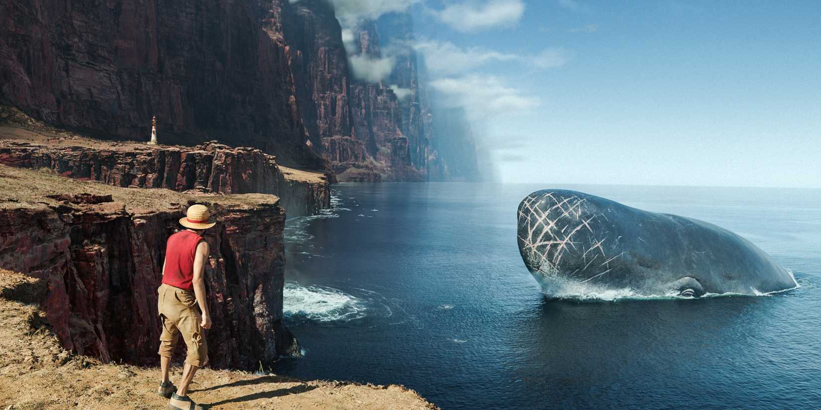 Luffy em pé em um penhasco observando Laboon, a baleia, emergir do oceano na adaptação de One Piece da Netflix