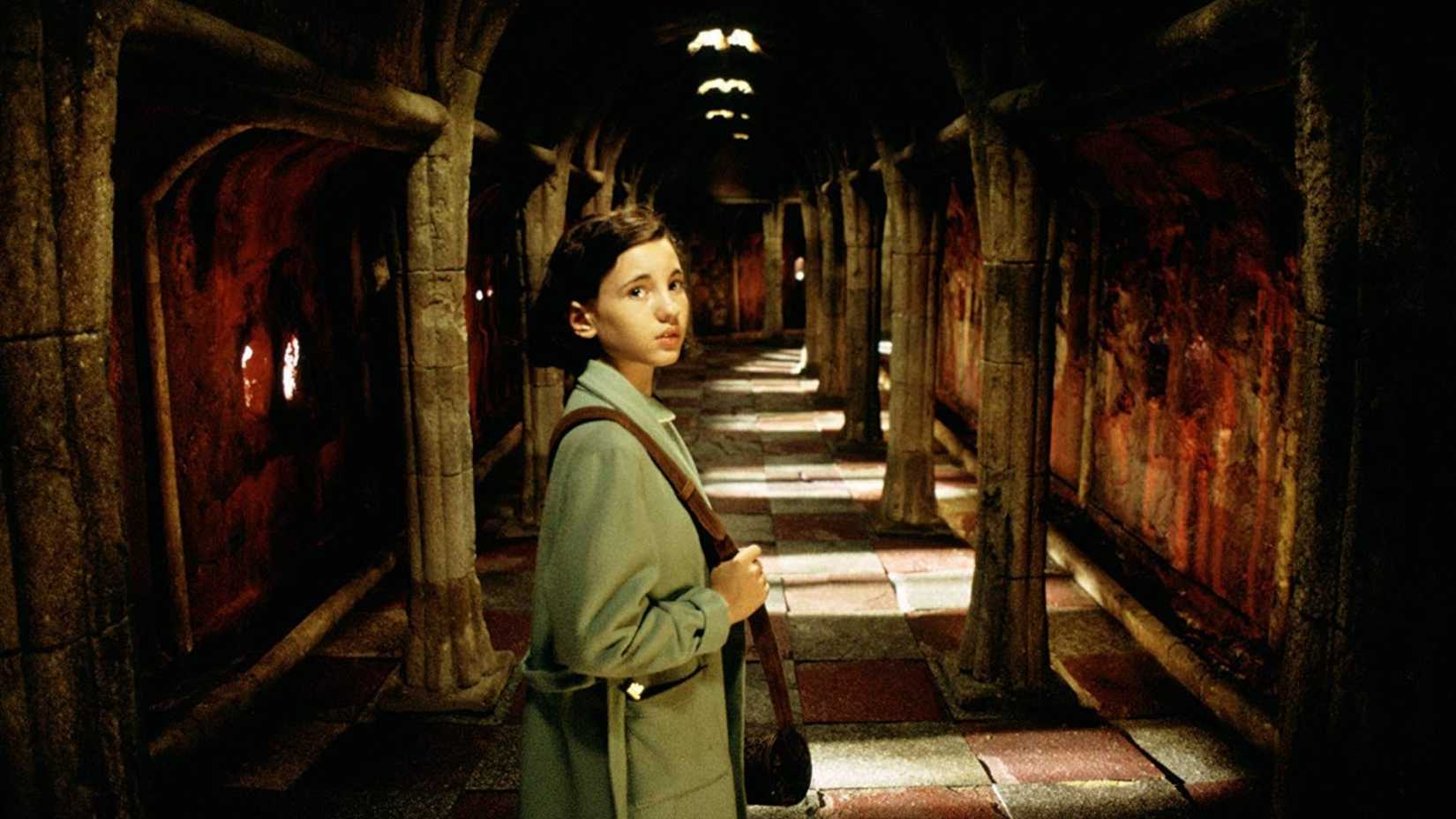 10 Horror Movie Oscar Wins That Are Indisputable 2 Ofelia looks over her shoulder while entering the labyrinth in Pan's Labyrinth