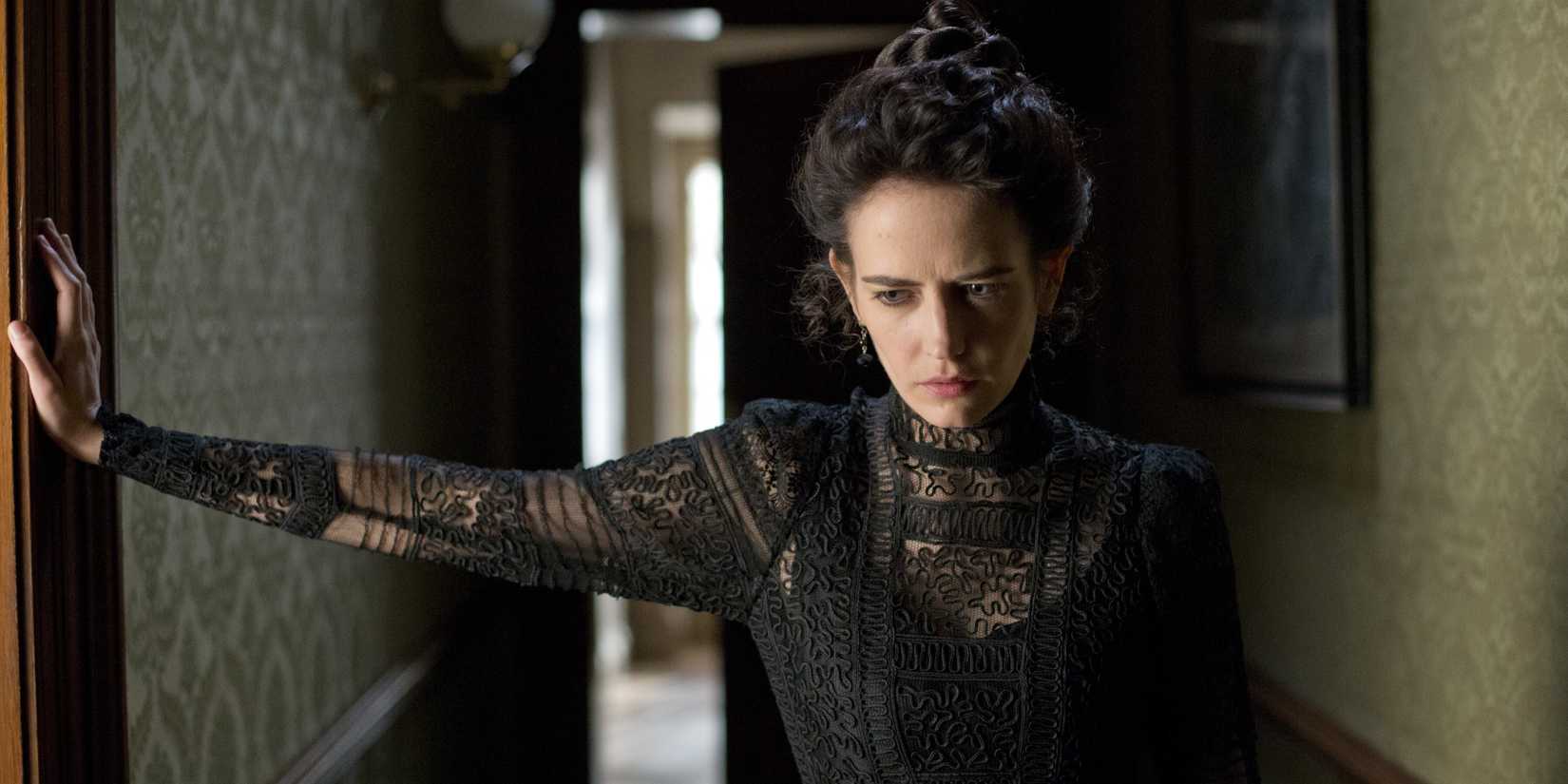 Eva Green as Vanessa Ives looks upset while touching the wall in Penny Dreadful