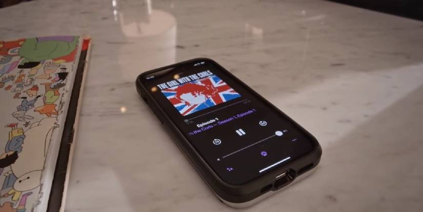 Phone playing Cinda Canning's The Girl with the Curls podcast in Only Murders in the Building