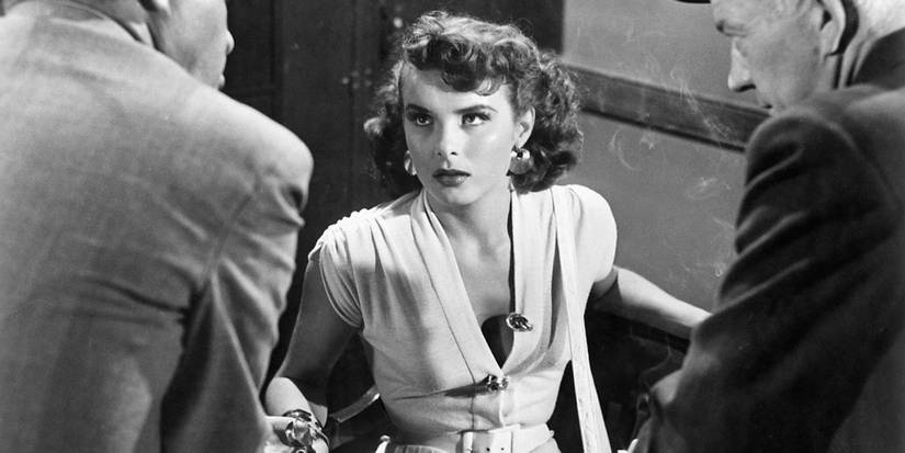 Candy is confronted by two men in Pickup on South Street