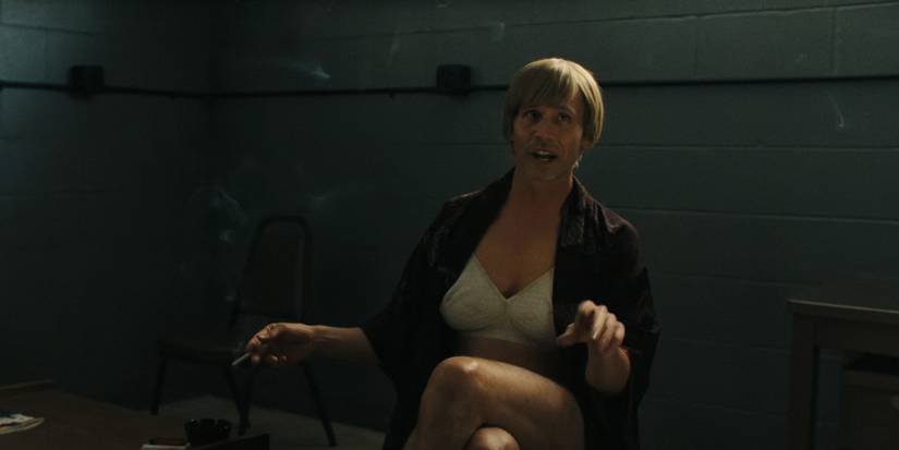 Richard Speck sits in a bra, panties, and a robe in Monster The Ed Gein Story