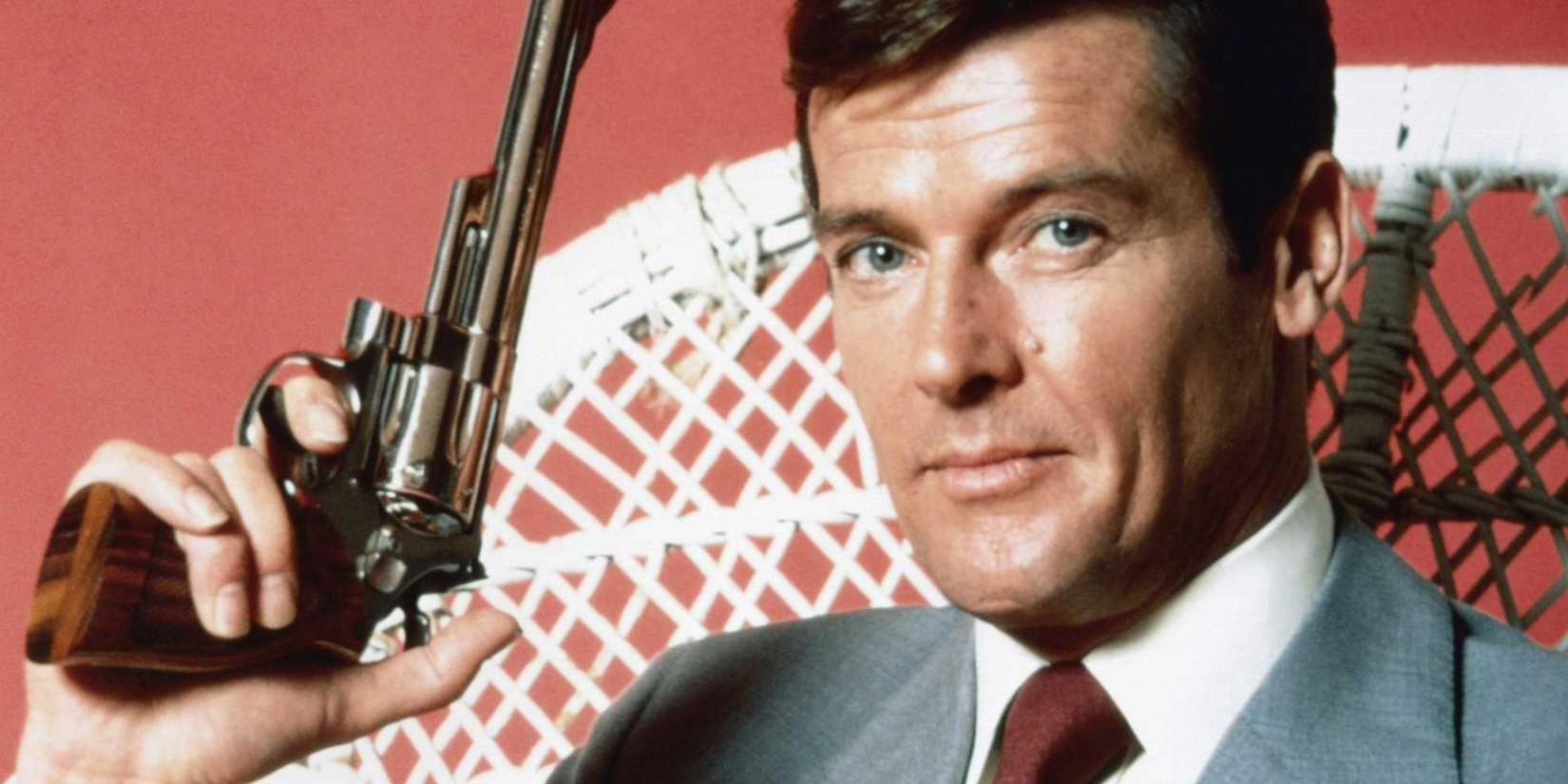 Roger Moore as James Bond holding a magnum revolver