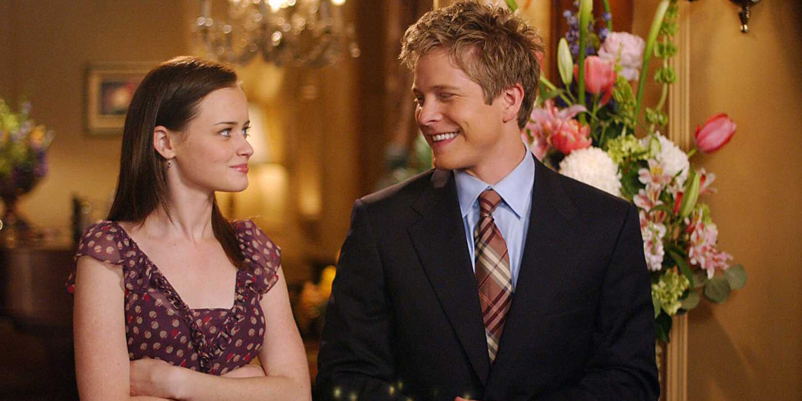 Rory (Alexis Bledel) sorrindo para Logan (Matt Czuchry) em Gilmore Girls