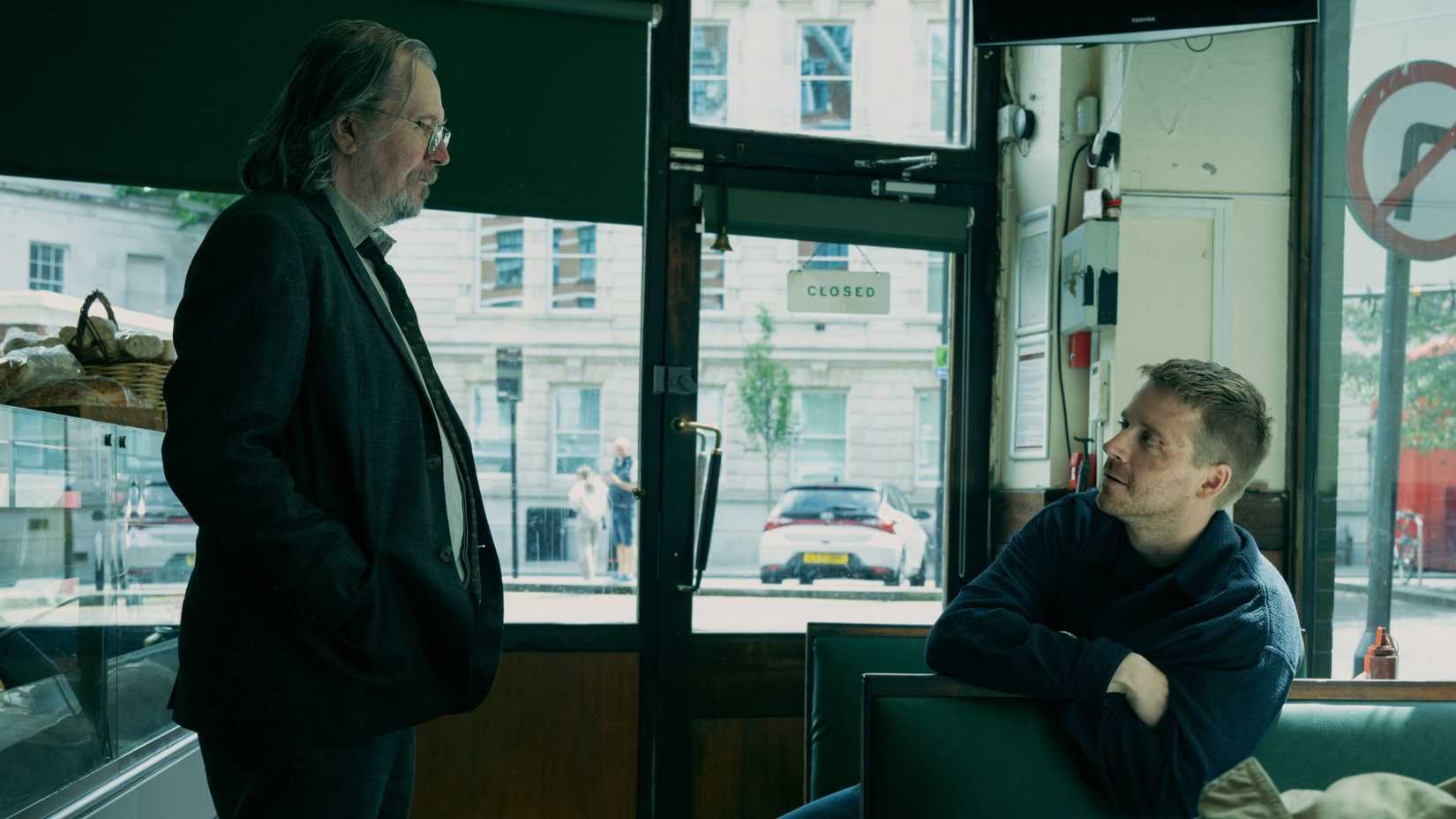 Lamb (Gary Oldman) talking to River (Jack Lowden) at a diner in Slow Horses season 5, episode 6.