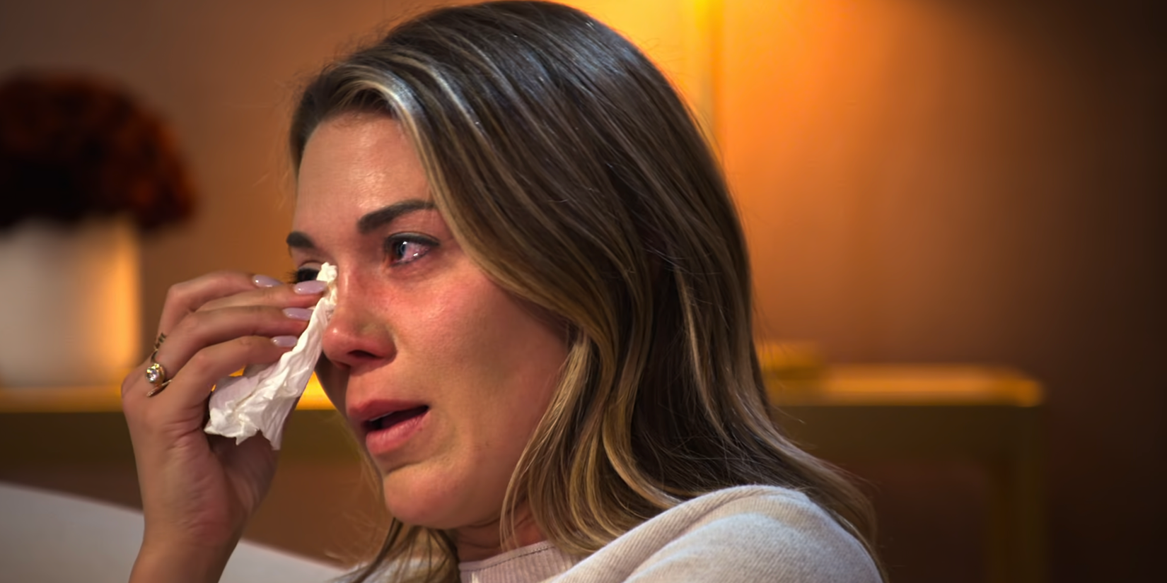 Sparkle Megan Walerius uses a tissue to wipe her tears on Love Is Blind season 9