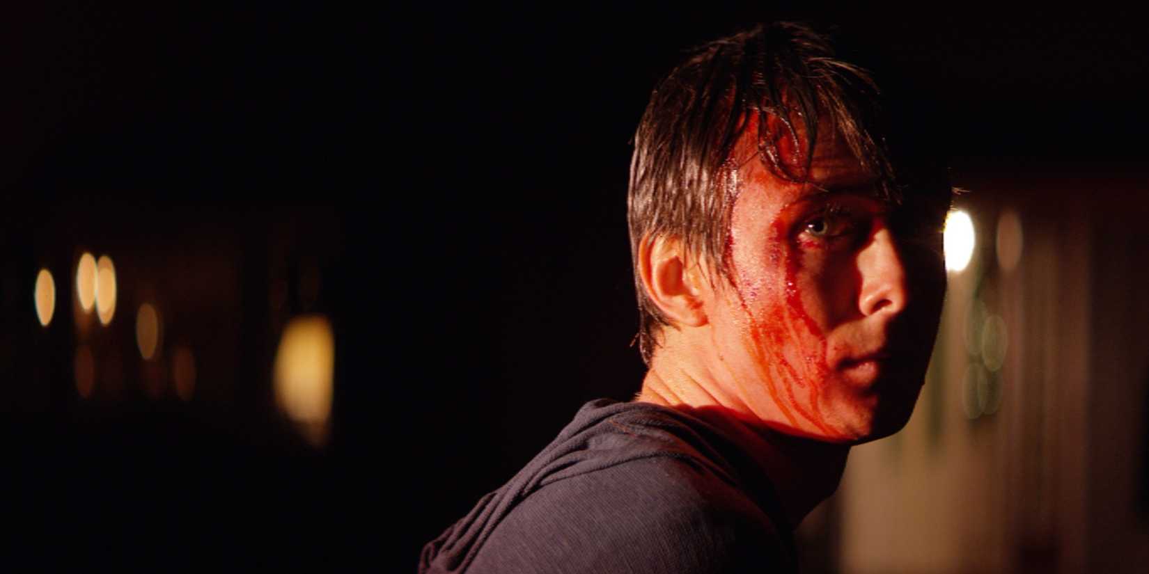 A boy covered in blood in Super Dark Times