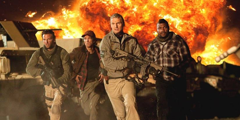 Liam Neeson, Bradley Cooper, Sharlto Copley, and Quinton "Rampage" Jackson run away from an explosion in The A-Team