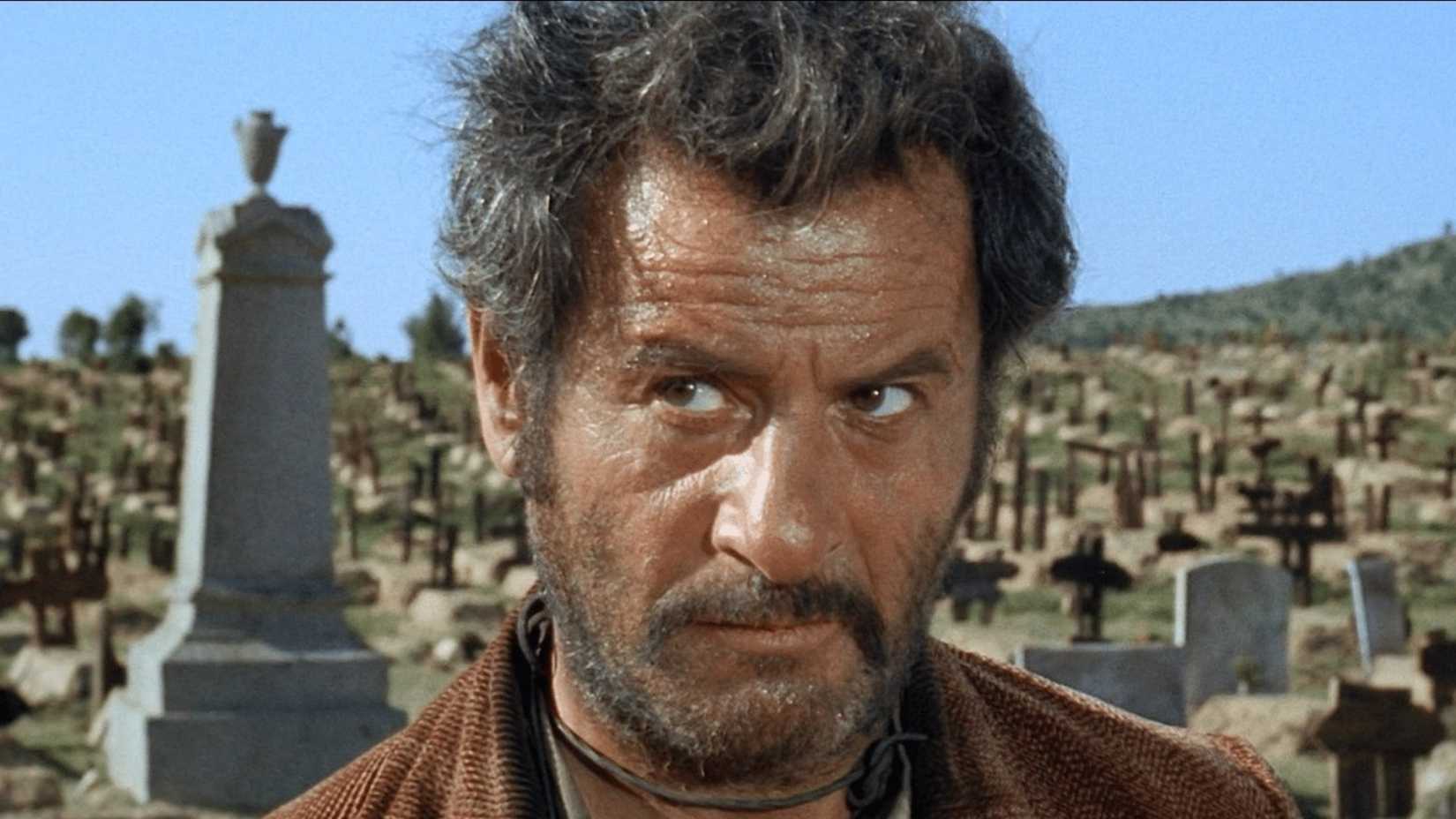 Tuco looks up suspiciously while standing in a graveyard in The Good, the Bad and the Ugly