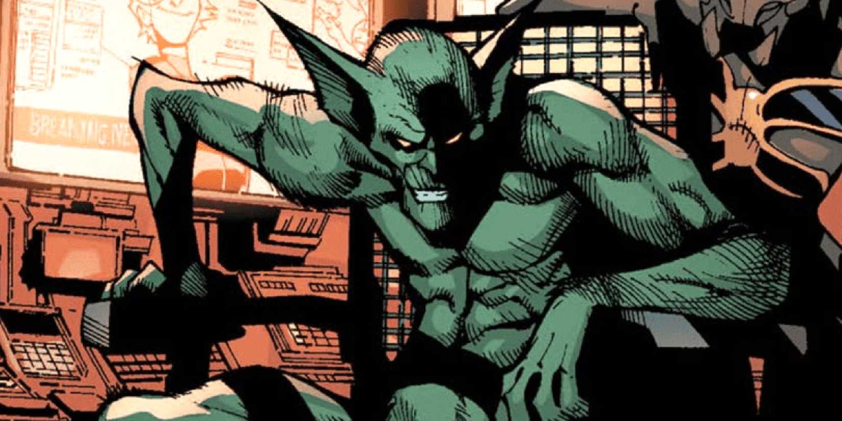 The Jackal smiles sinisterly at his desk in Marvel Comics