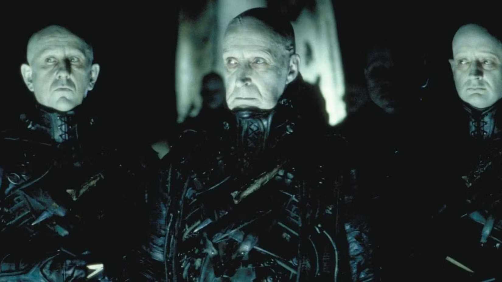 The Strangers standing in the shadows in Dark City