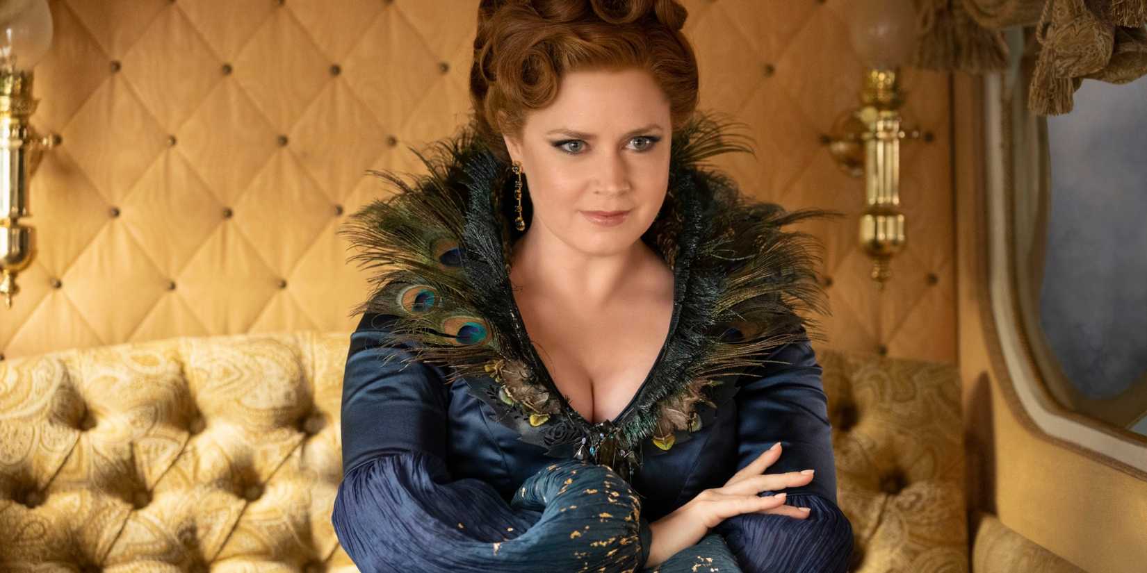 Giselle looking menacing and dressed up as a villain as she rides in a carriage in Disenchanted.