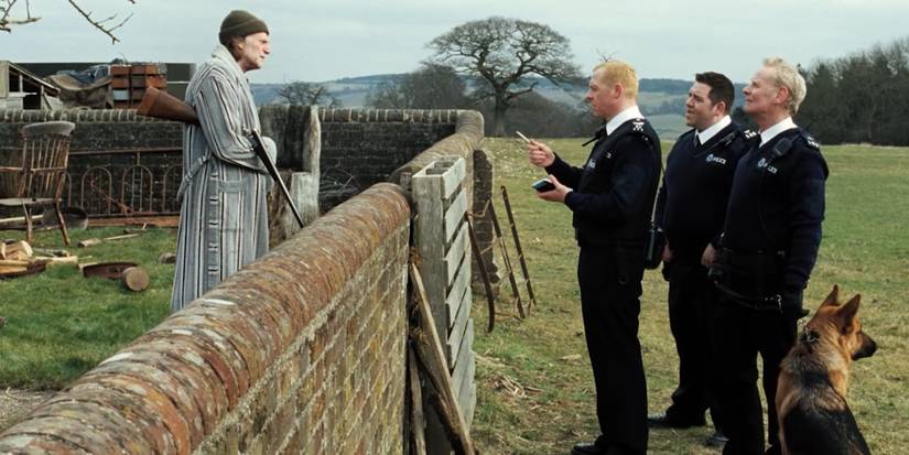 Angel, Danny, and Walker talking to the farmer on his land about his gun in H๏τ Fuzz.