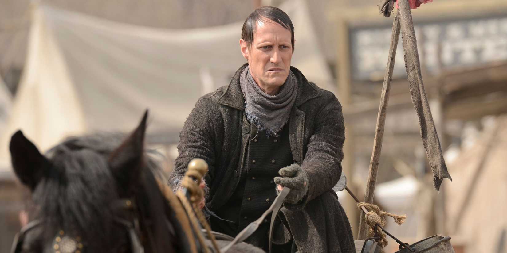 The Swede looking grim while riding a horse
