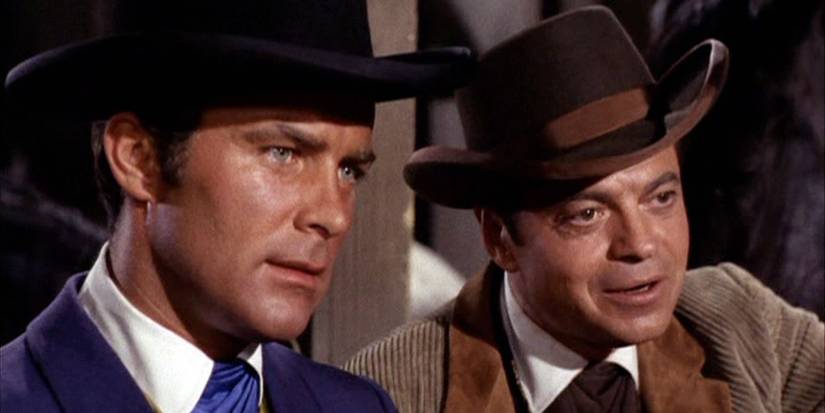Os personagens principais usando chapéus em The Wild Wild West