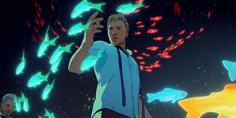 Jovem cercado por peixes em Fish Night