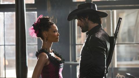 Maeve and Hector facing each other