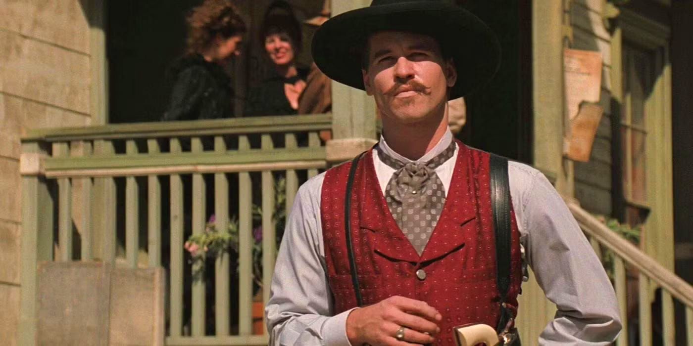 Val Kilmer standing outside in Tombstone