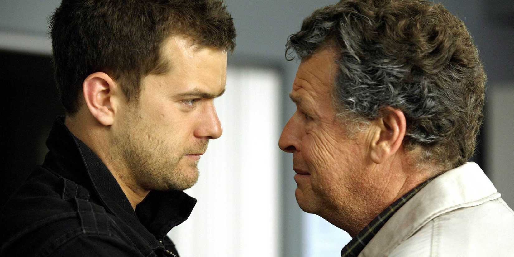 Walter Bishop staring into Peter Bishop's eyes with remorse on his face in Fringe