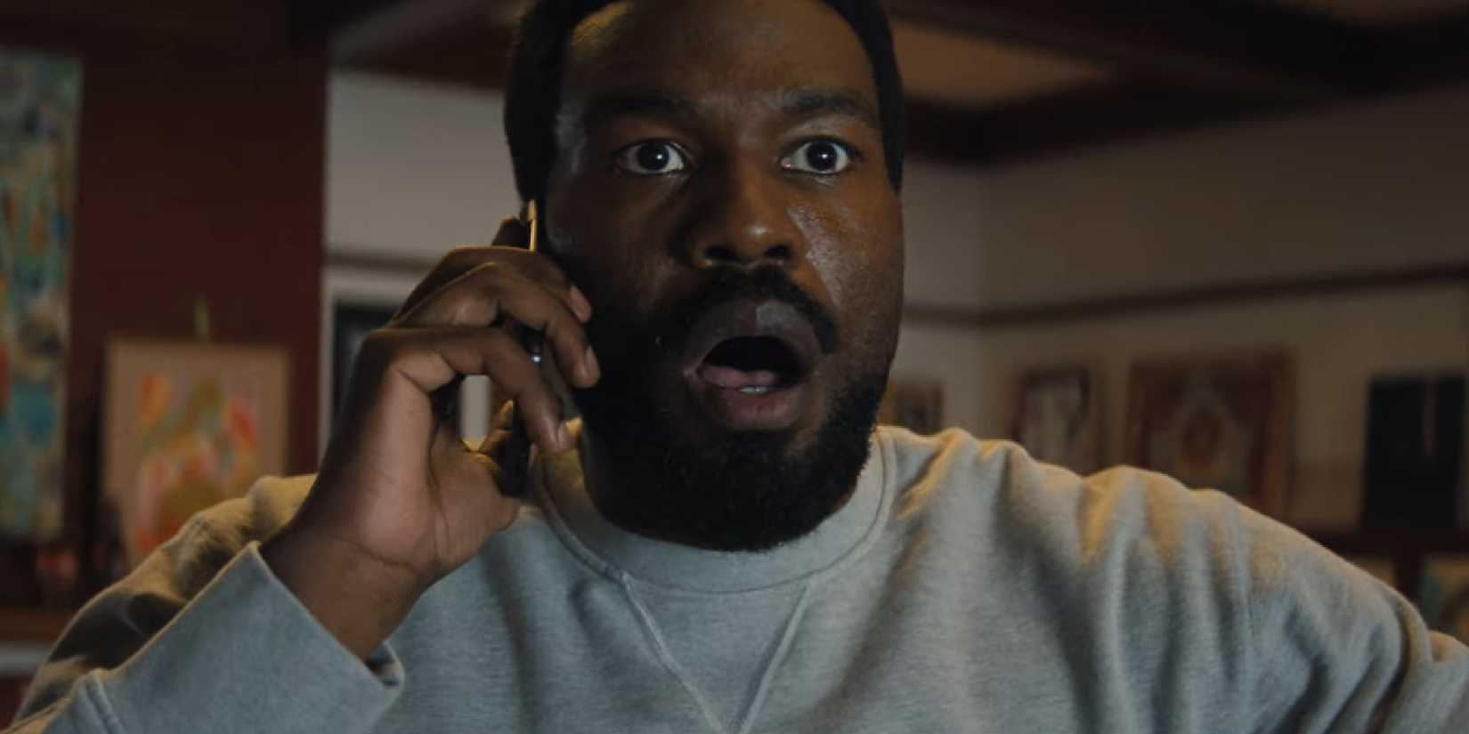 WONDER MAN'S SIMON WILLIAMS LOOKING PANICKED ON THE PHONE