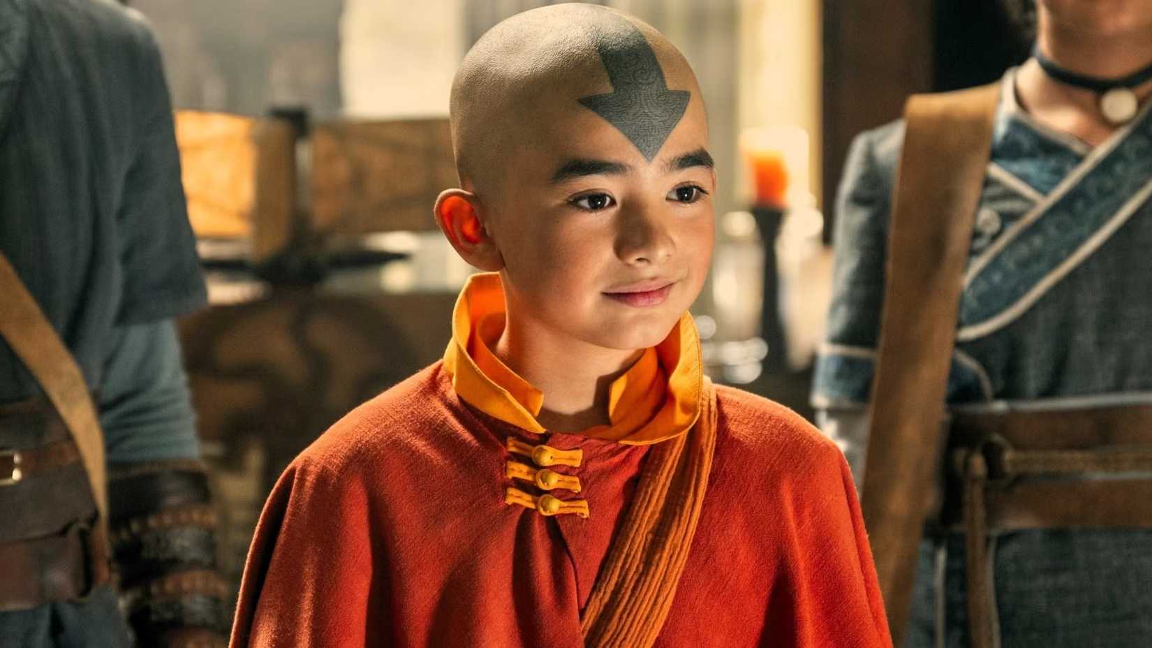 Aang smiles while looking to the side in Netflix's Avatar The Last Airbender live-action show
