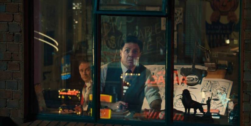 Stan Lee and Jack Kirby in their office looking outside in The Fantastic Four: First Steps