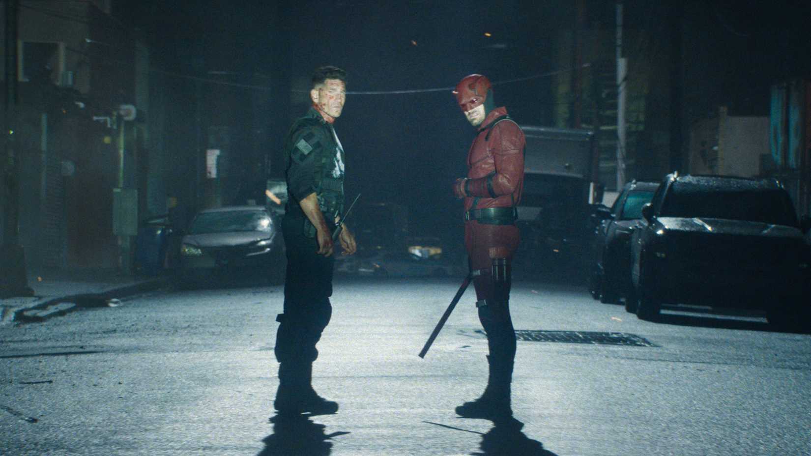 Jon Bernthal's Punisher and Charlie Cox's Daredevil in a street in Daredevil: Born Again season 1