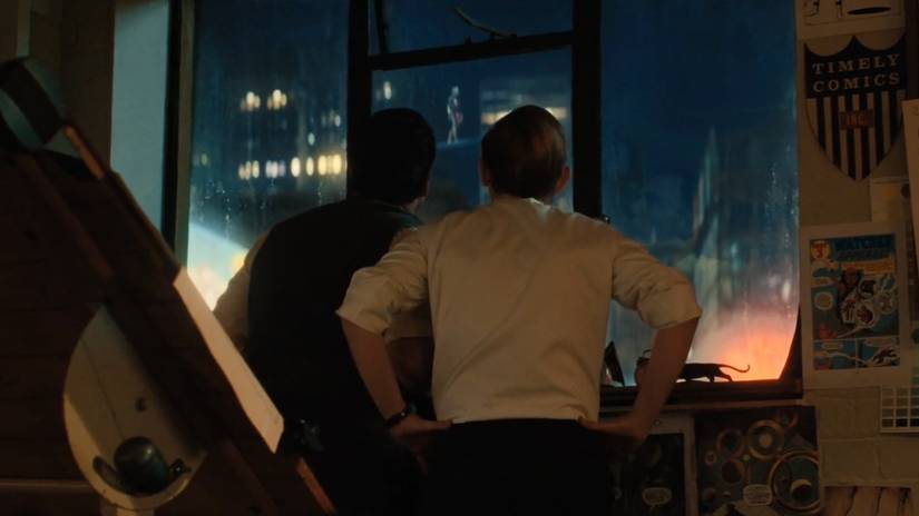 Stan Lee and Jack Kirby from the back looking at Silver Surfer in The Fantastic Four: First Steps