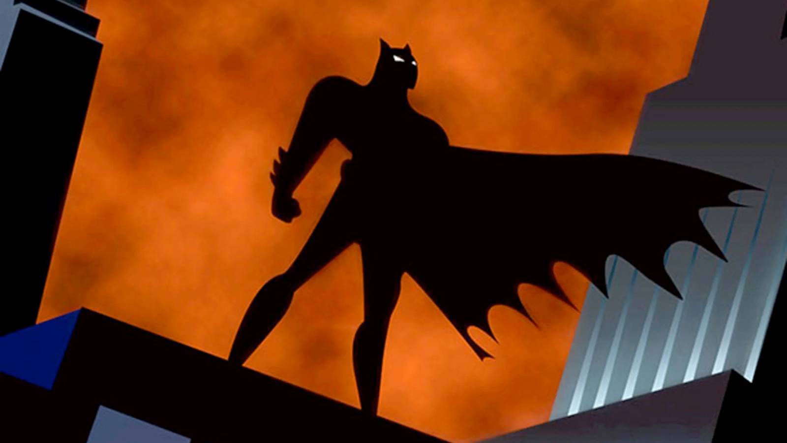Batman's silhouette on Gotham rooftops in Batman the Animaed Series