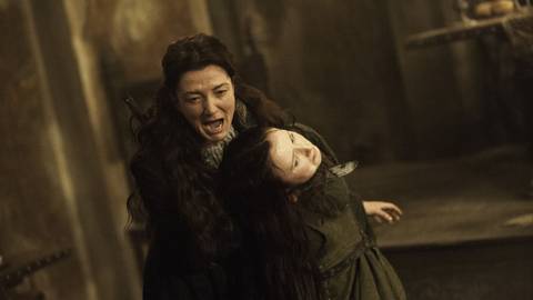 Catelyn Stark screaming in complete shot during The Red Wedding scene in Game of Thrones