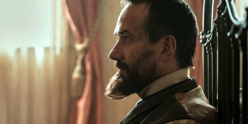 charles guiteau leans his back on a bed s foot board in death by lightning