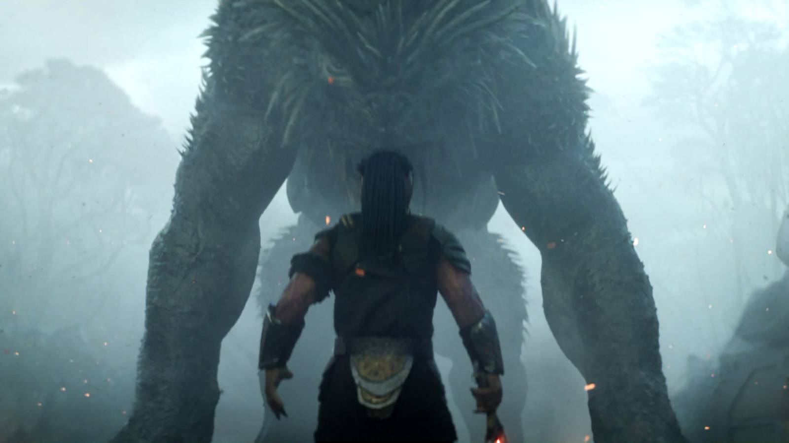 Dek facing down the Kalisk in a foggy setting in Predator: Badlands
