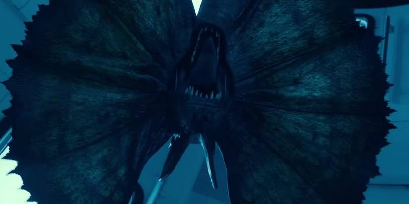 Dilophosaurus atacando Lewis Dodgson em Jurassic World Dominion