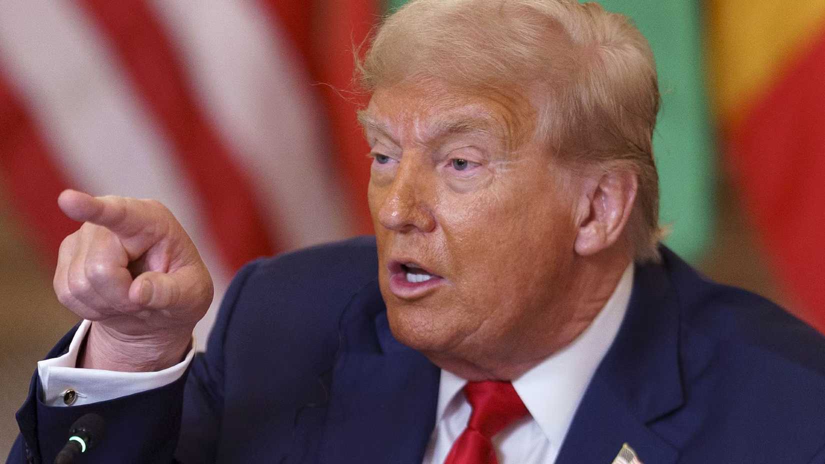 President Donald Trump pointing