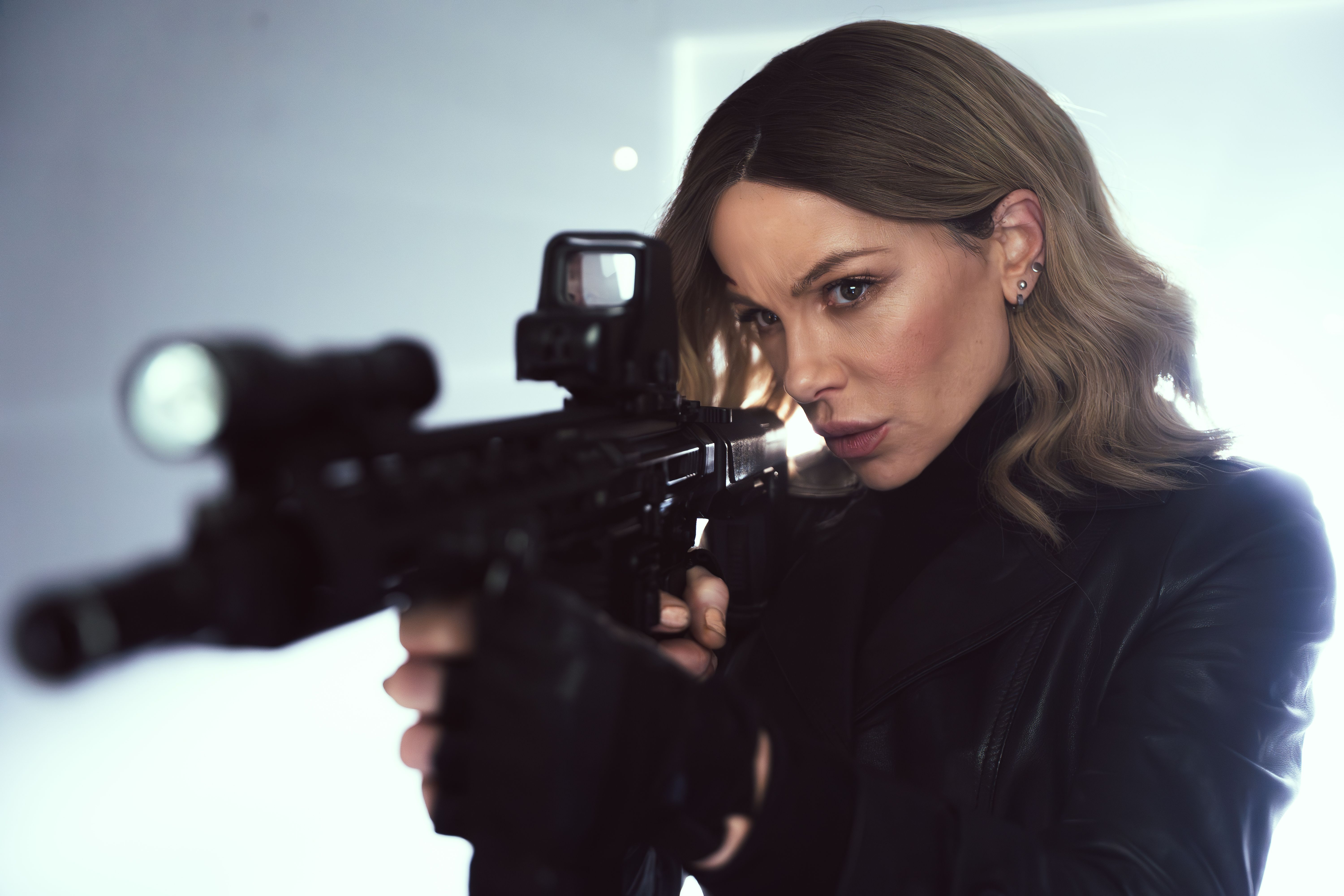 Kate Beckinsale aims her gun in Wildcat