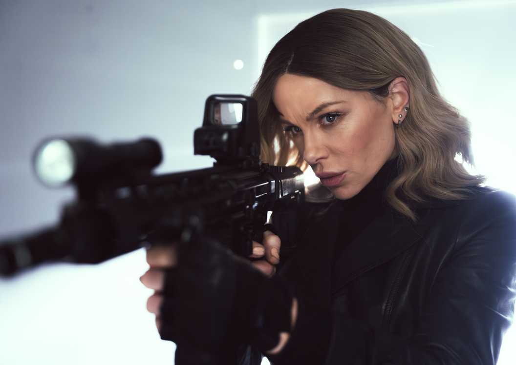 Kate Beckinsale aims her gun in Wildcat