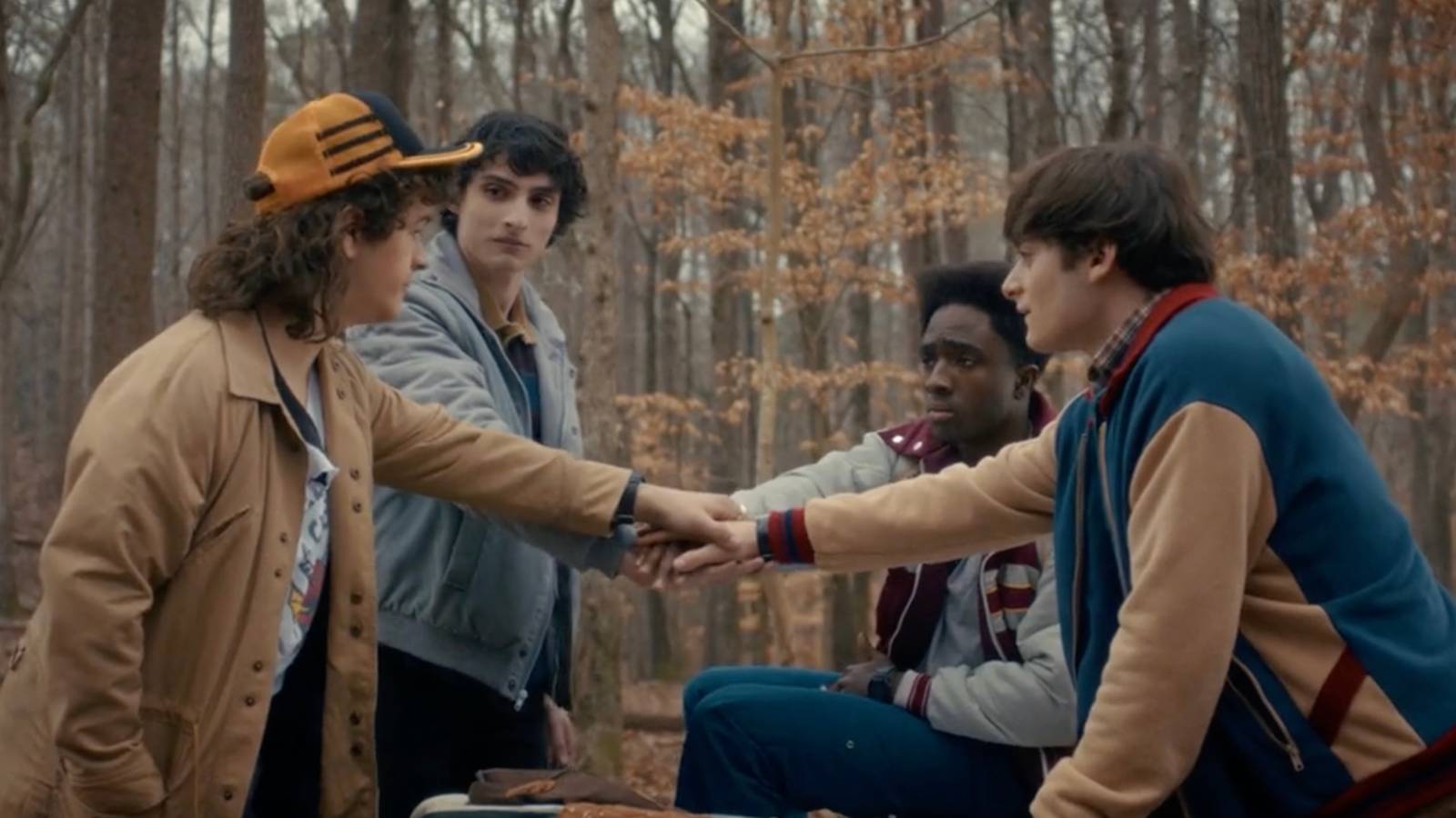 Dustin Mike Lucas and Will join hands in Stranger Things season 5