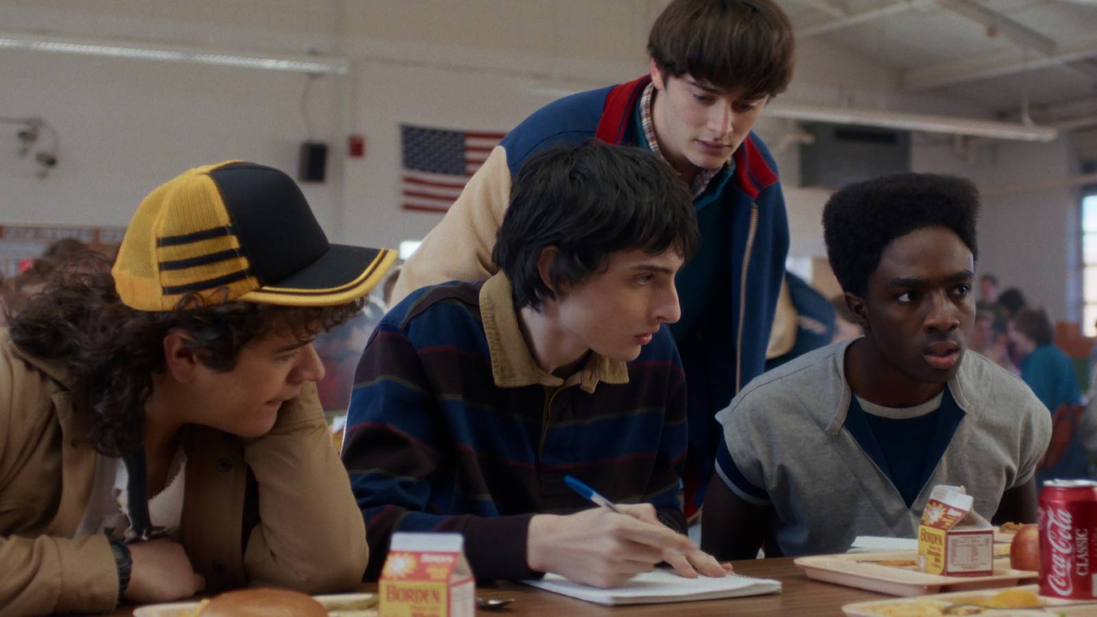 Dustin Will Mike and Lucas sit in the cafeteria in Stranger Things season 5 episode 1