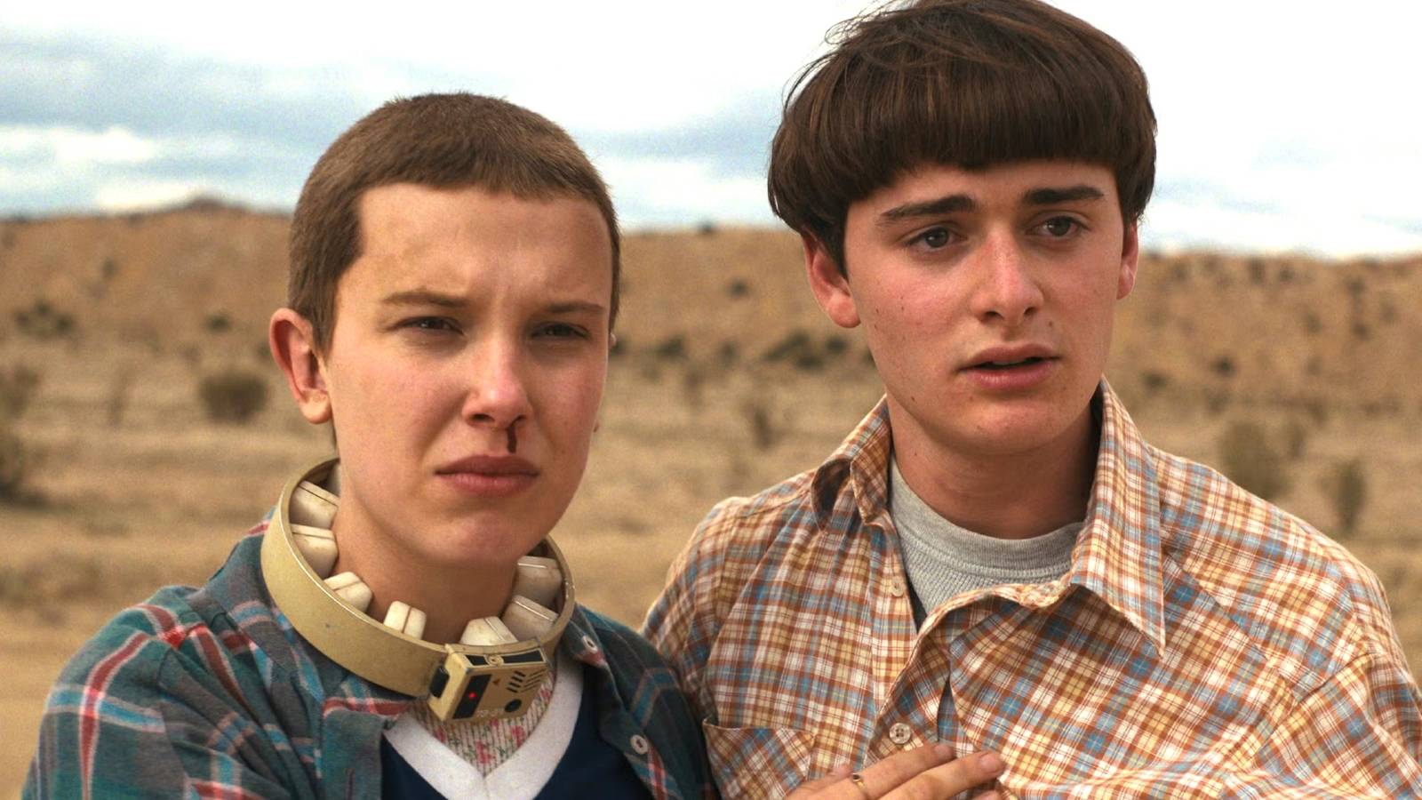 Eleven and Will look scared in Stranger Things season 4