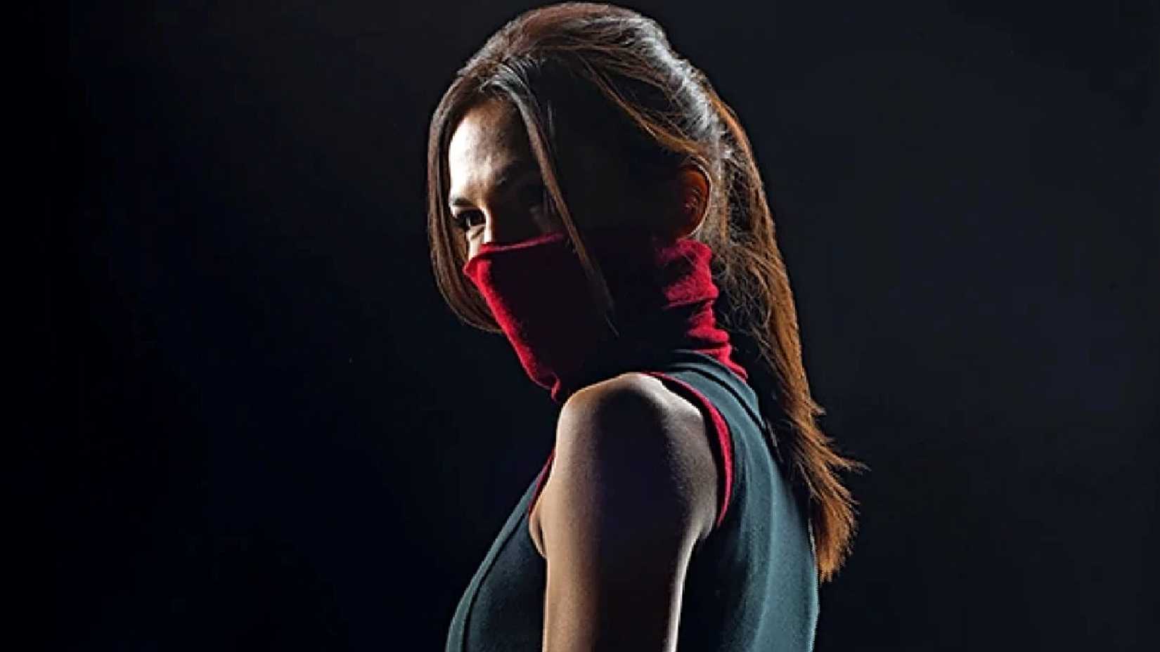 Elodie Yung's Elektra Natchios wears a red scarf in Daredevil season 2 poster
