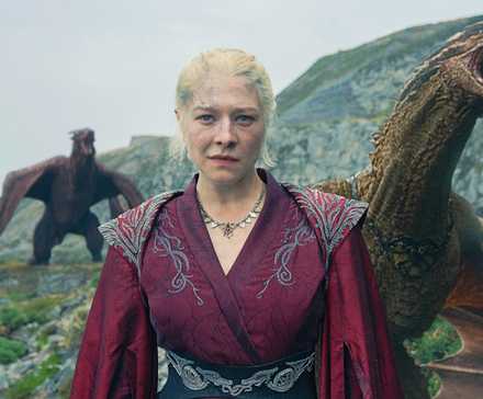 Game Of Thrones' 15 Best Targaryens, Ranked 4 Emma D'Arcy as Queen Rhaenyra Targaryen with dragons behind her in House of the Dragon season 2