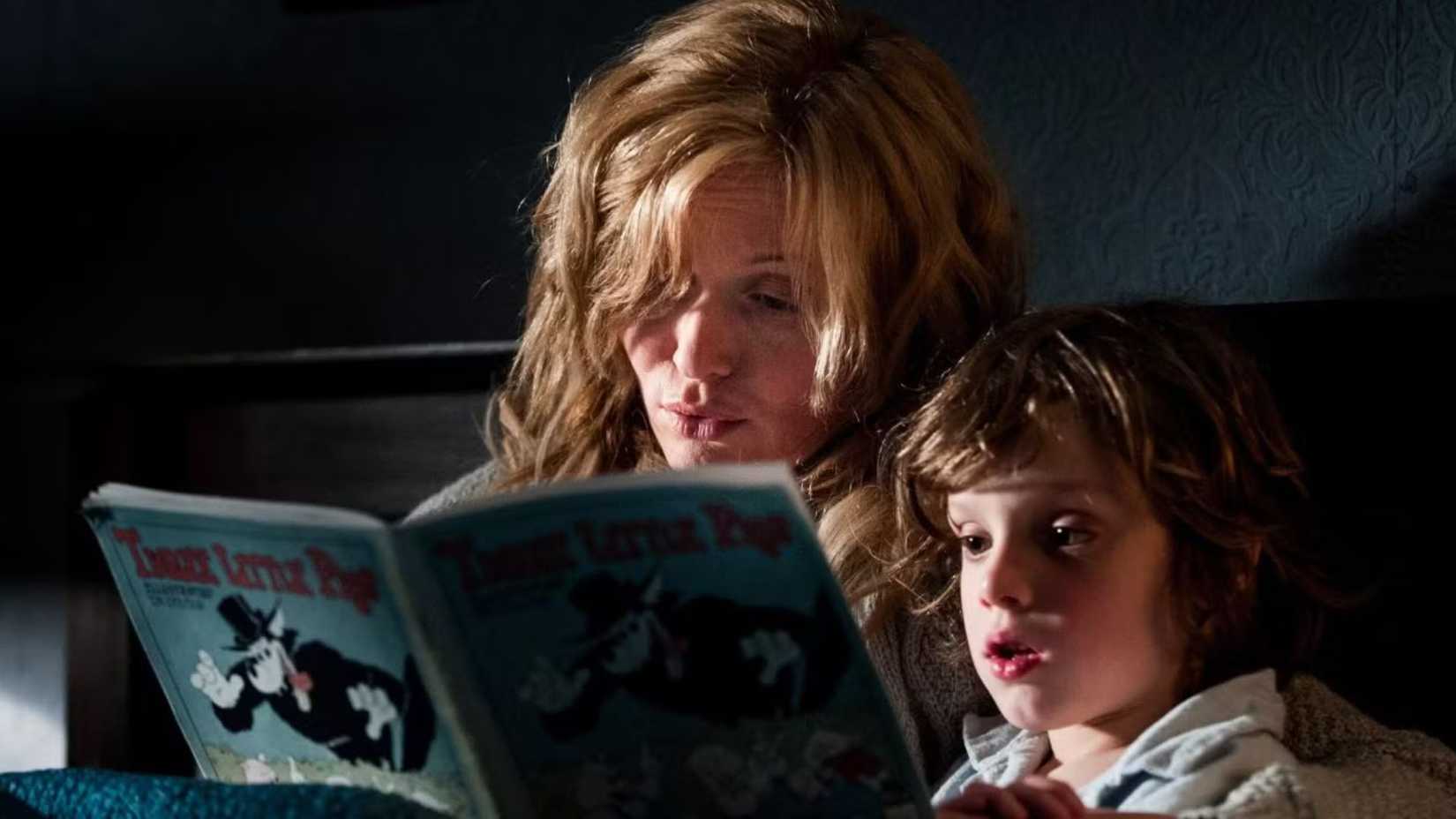 Essie Davis as Amelia Vanek reading to her son in The Babadook