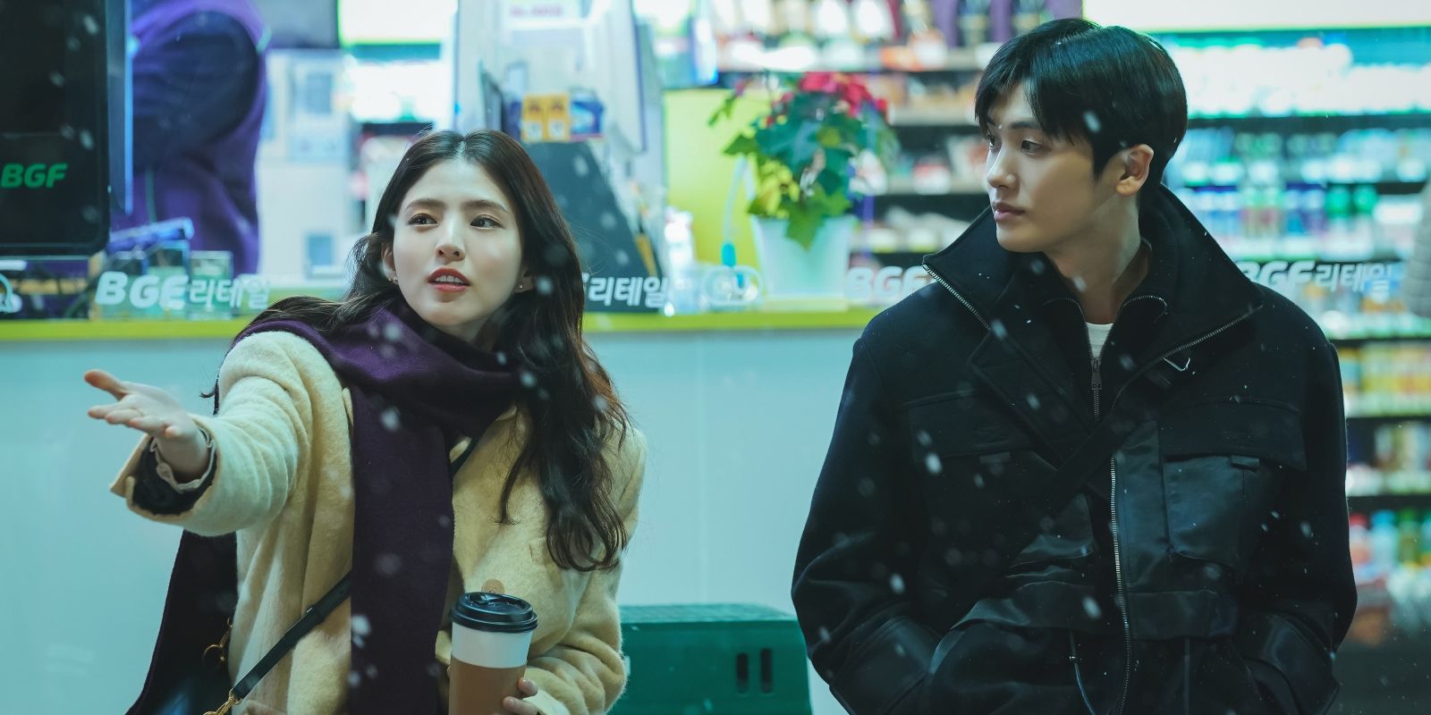 Eunsoo and Seon Woo stand in the snow in Soundtrack #1