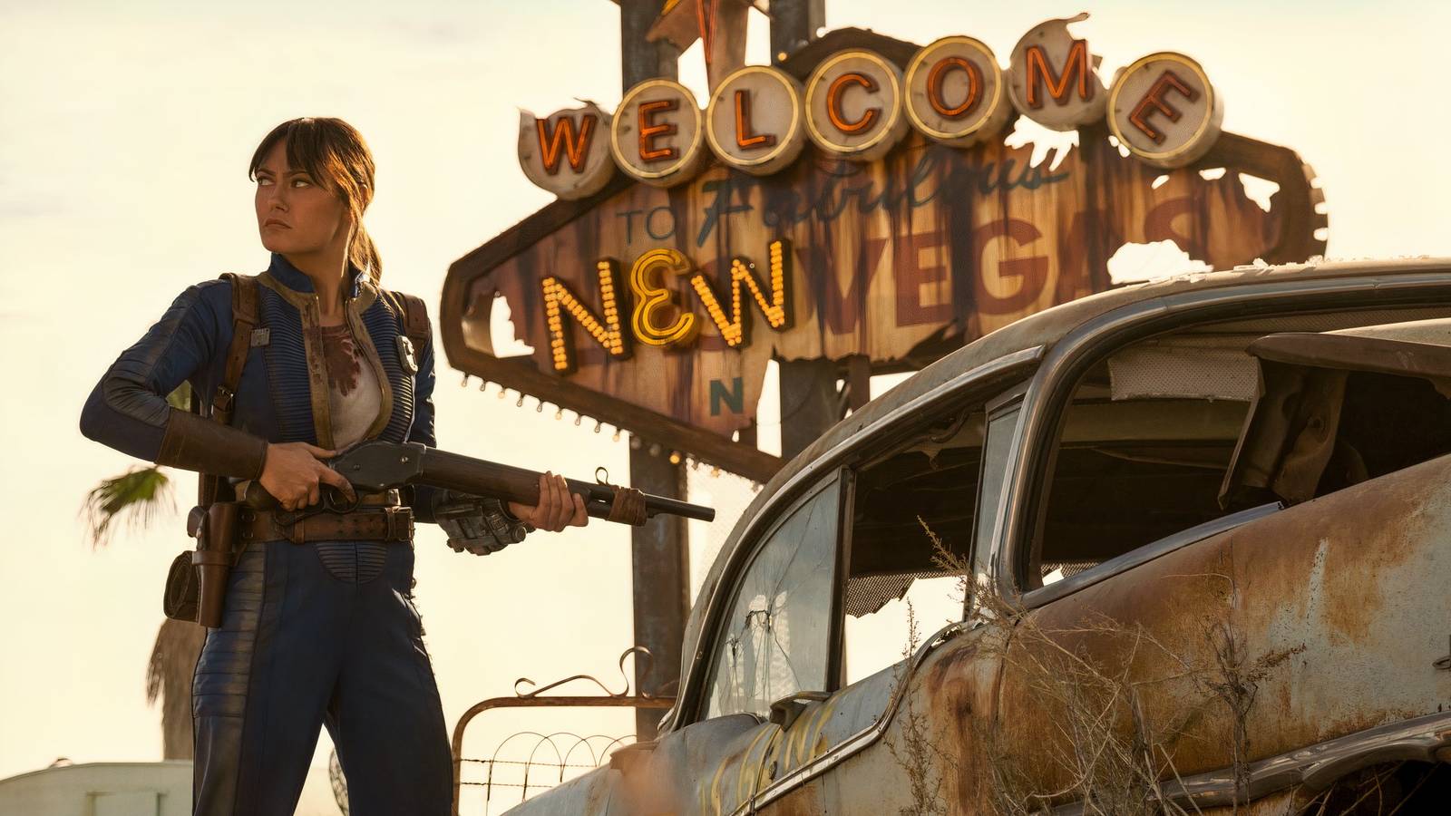 Ella Purnell in front of the New Vegas sign