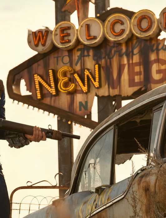 Video Game Adaptations Are Officially Dead Ella Purnell in front of the New Vegas sign