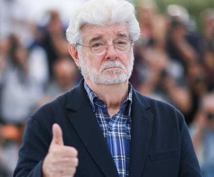 George Lucas attends a photocall after winning the honorary Palme d'Or at the 77th Cannes Film Festival in Cannes, France
