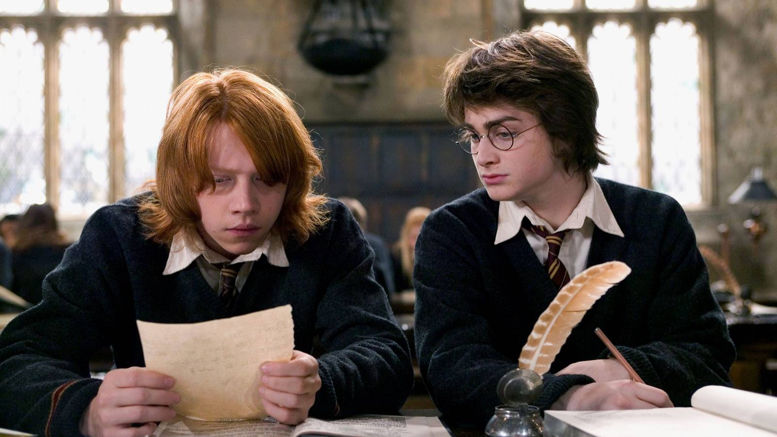 Harry and Ron doing homework in Harry Potter