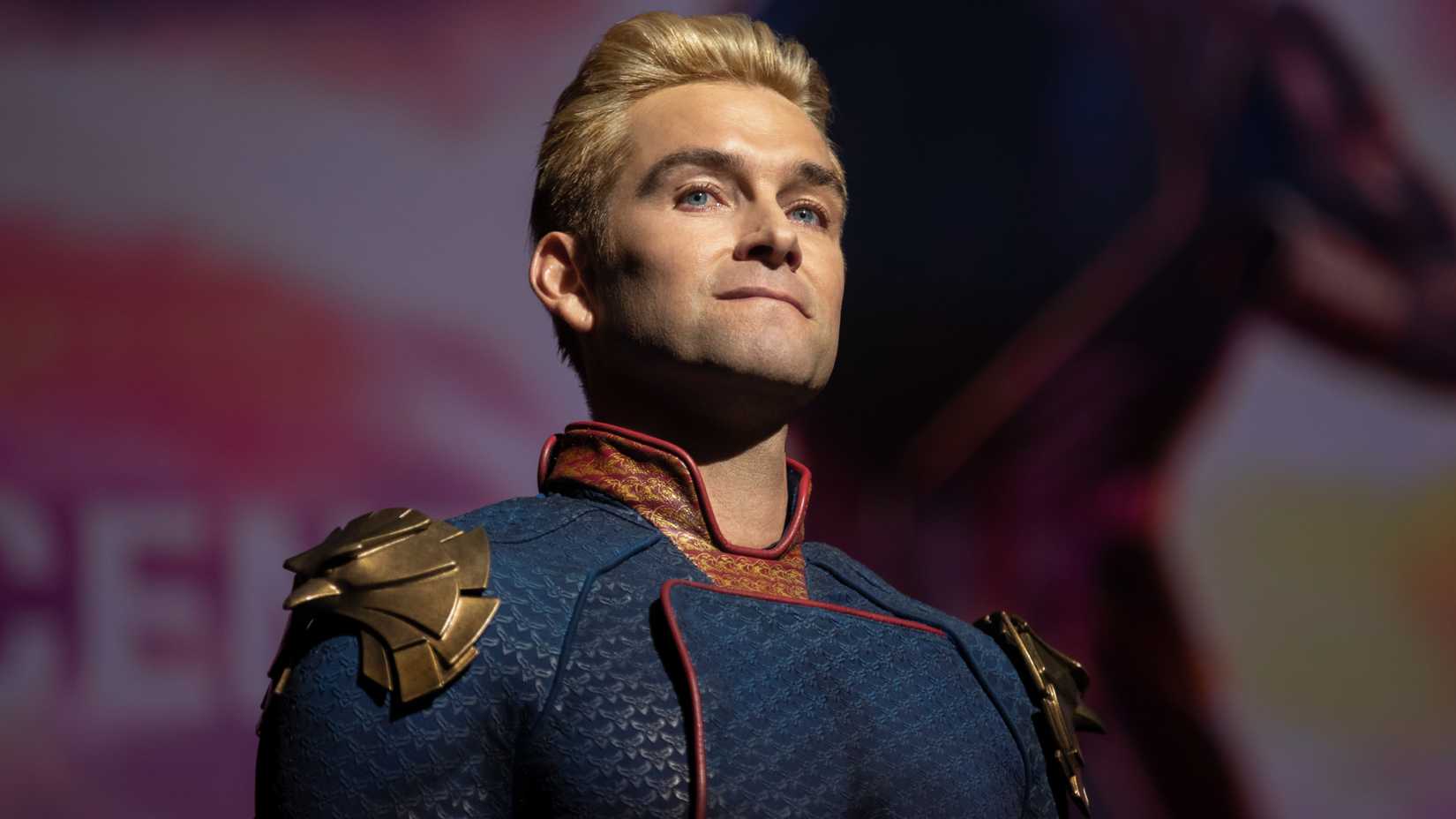 12 Prime Video Shows That Get Better With Every Episode 8 Homelander looking into a crowd with a blank expression in The Boys