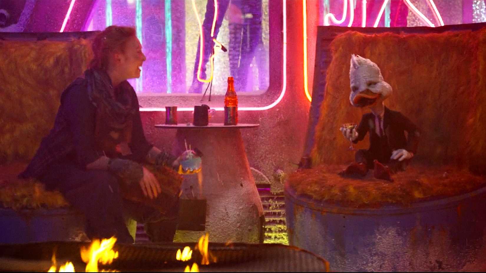 Howard the Duck drinks alcohol and laughs in an alien bar in Guardians of the Galaxy Vol 2