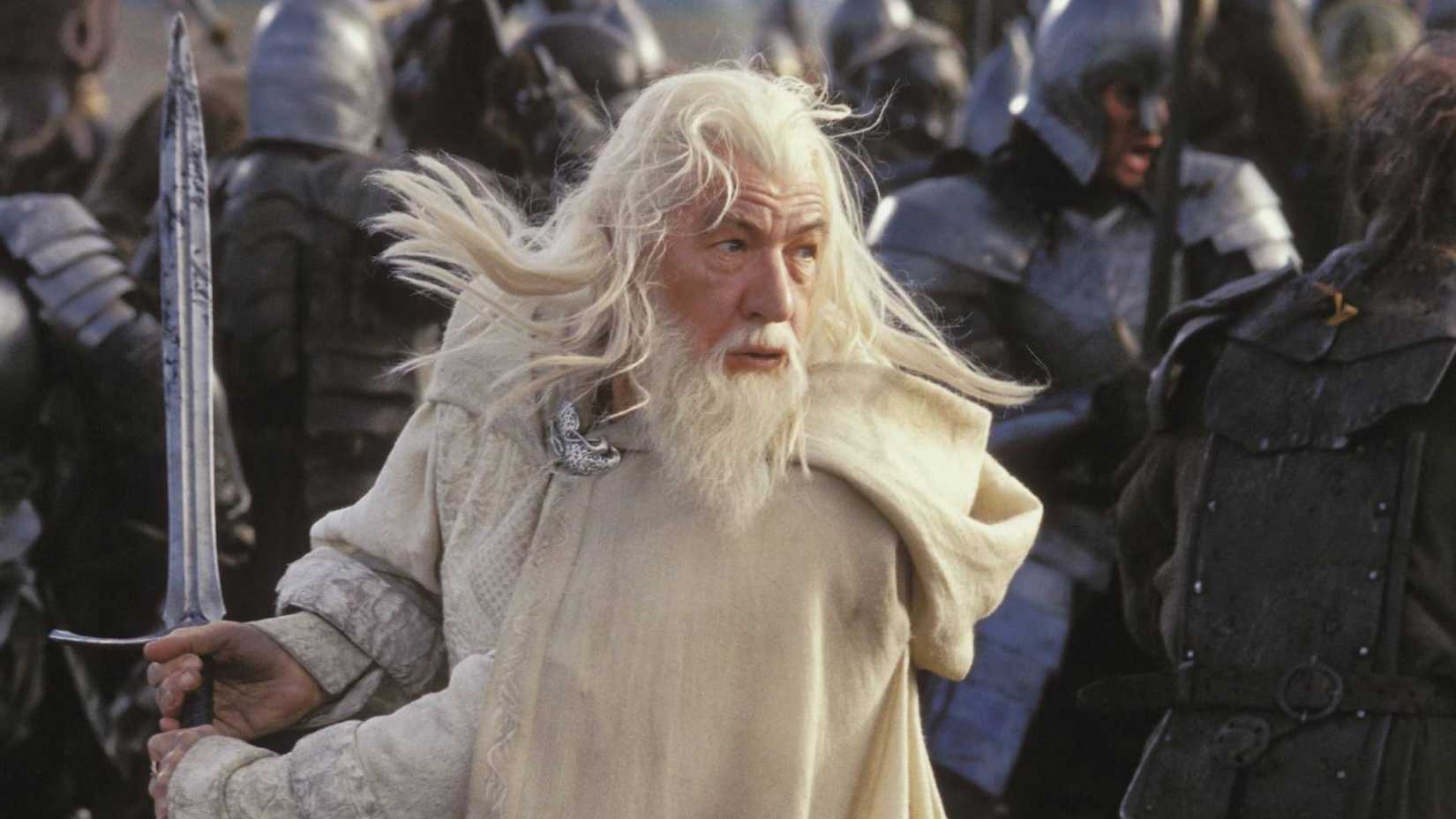 Ian McKellen holding a sword as Gandalf in The Lord of the Rings